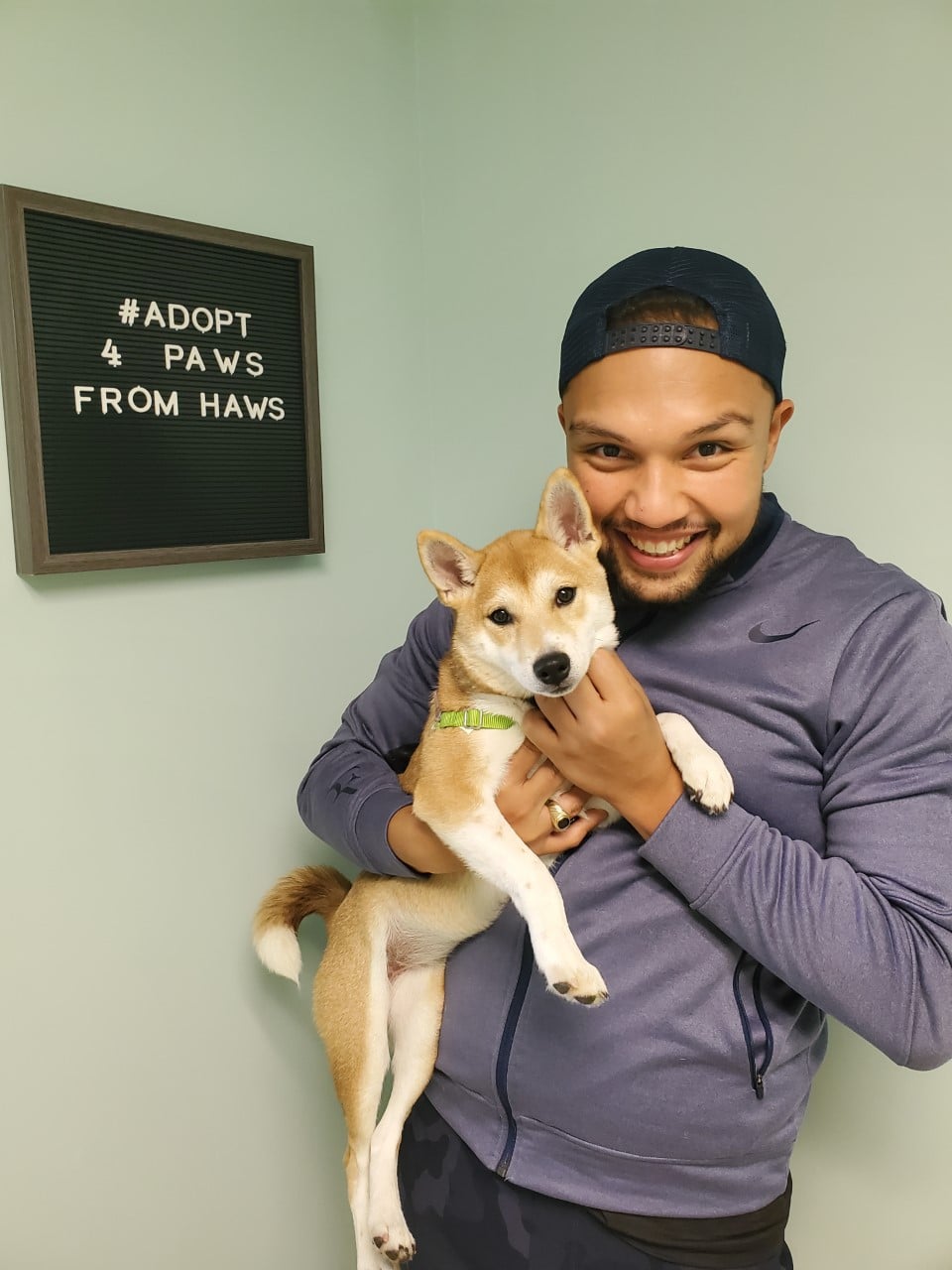 man holding dog